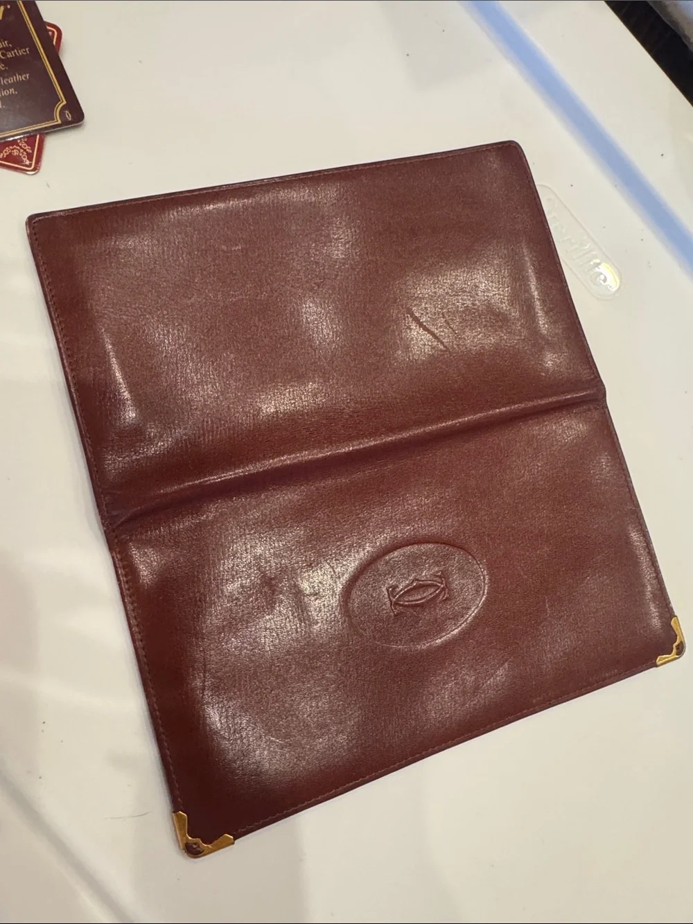 Cartier Burgundy Leather Long Wallet with Gold Corner Accents